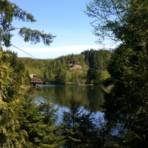 A view of the zipline course over the lake in Warrenton OR