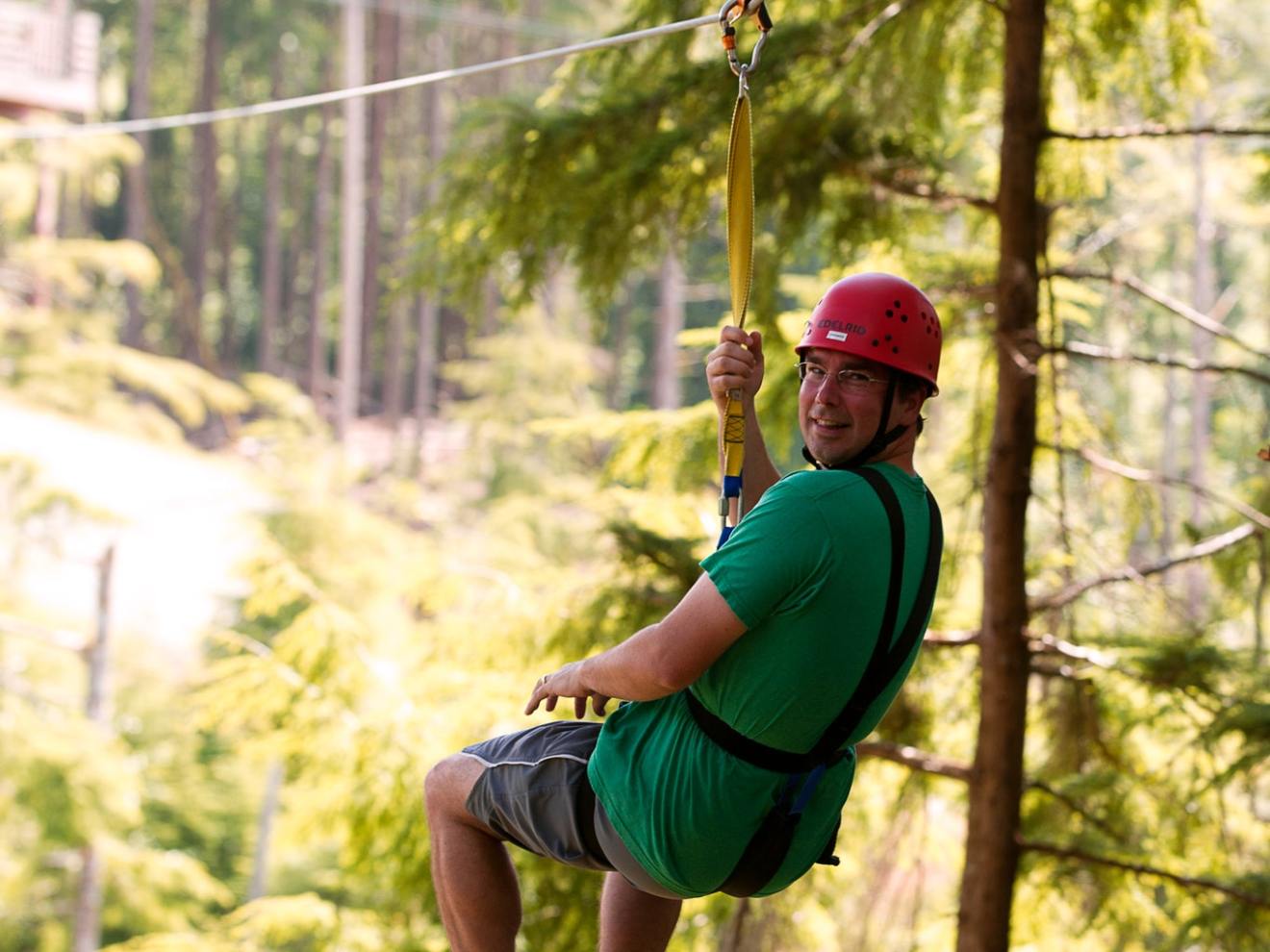 A man on a High Life Adventures zip line