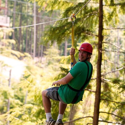 A man on a High Life Adventures zip line