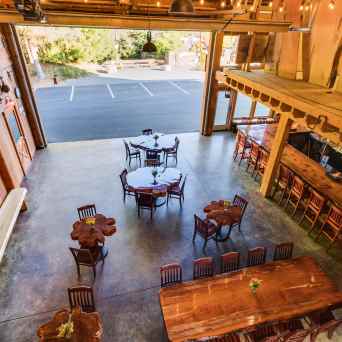 a room filled with furniture and vase on a table