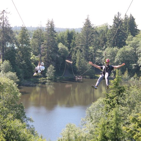 people enjoying a zip line experience